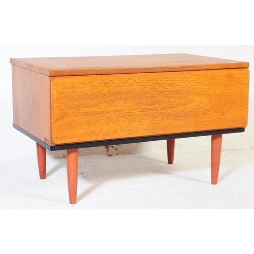628 - Beaver & Tapley Furniture - A mid century retro teak wood side table cabinet. Raised on turned and t... 