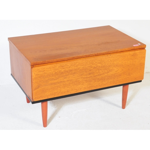 628 - Beaver & Tapley Furniture - A mid century retro teak wood side table cabinet. Raised on turned and t... 