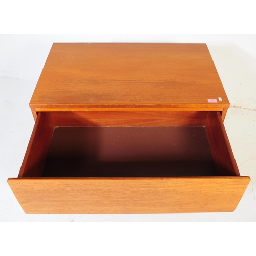 628 - Beaver & Tapley Furniture - A mid century retro teak wood side table cabinet. Raised on turned and t... 