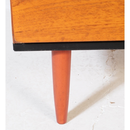 628 - Beaver & Tapley Furniture - A mid century retro teak wood side table cabinet. Raised on turned and t... 