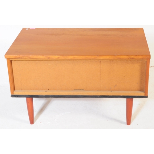 628 - Beaver & Tapley Furniture - A mid century retro teak wood side table cabinet. Raised on turned and t... 