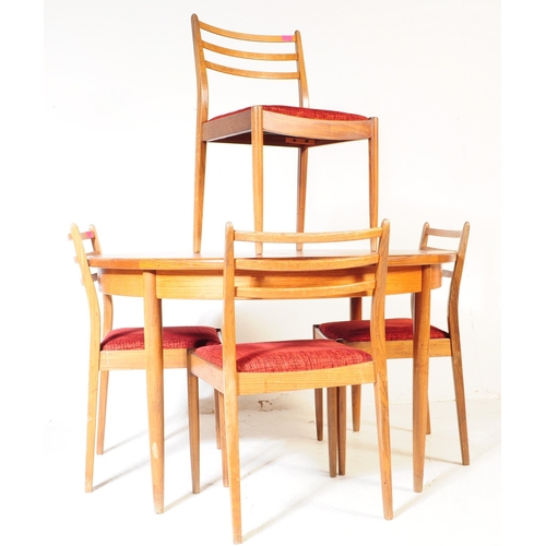 630 - G Plan Furniture - A retro mid 20th century teak dining table with four dining chairs. The table of ... 