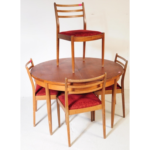 630 - G Plan Furniture - A retro mid 20th century teak dining table with four dining chairs. The table of ... 