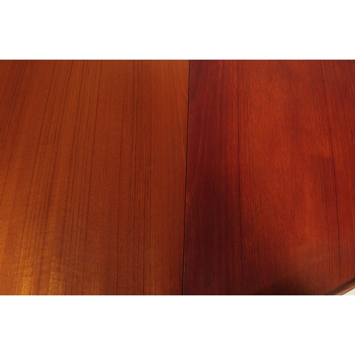 630 - G Plan Furniture - A retro mid 20th century teak dining table with four dining chairs. The table of ... 