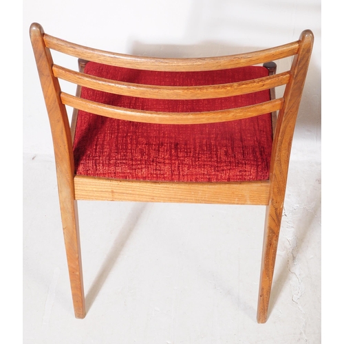 630 - G Plan Furniture - A retro mid 20th century teak dining table with four dining chairs. The table of ... 