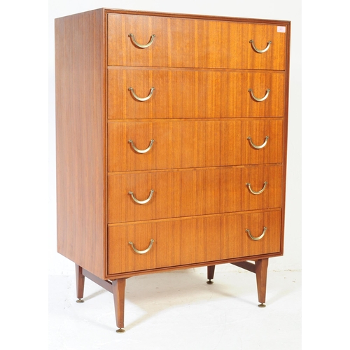 631 - Meredew Furniture - Mid 20th century teak chest of drawers. Rectangular form with a bank of five ful... 