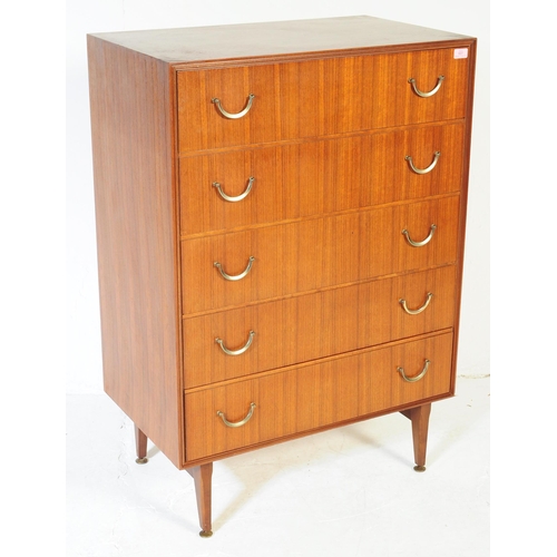 631 - Meredew Furniture - Mid 20th century teak chest of drawers. Rectangular form with a bank of five ful... 