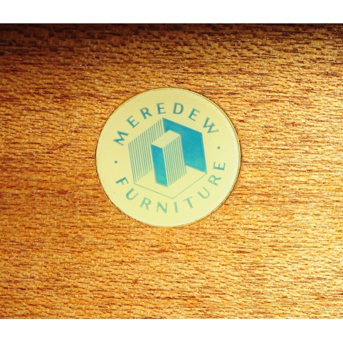 631 - Meredew Furniture - Mid 20th century teak chest of drawers. Rectangular form with a bank of five ful... 