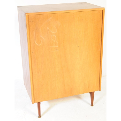 631 - Meredew Furniture - Mid 20th century teak chest of drawers. Rectangular form with a bank of five ful... 