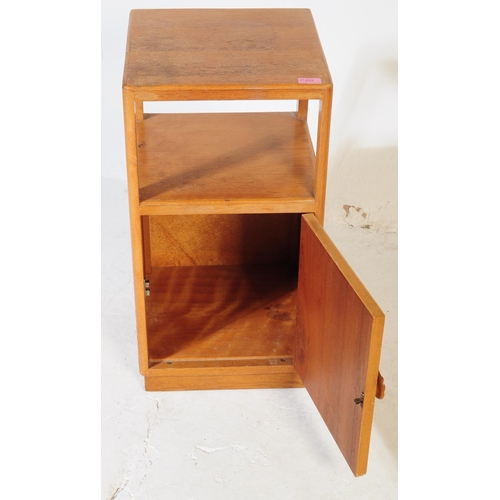 632 - A pair of retro vintage late 20th century plywood bedside cabinets having open upper, above cupboard... 