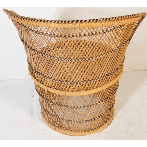 633 - A vintage 20th century circa 1980s bamboo wicker rattan garden conservatory chairs. One larger of ci... 