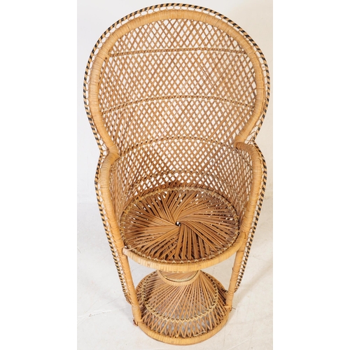 633 - A vintage 20th century circa 1980s bamboo wicker rattan garden conservatory chairs. One larger of ci... 