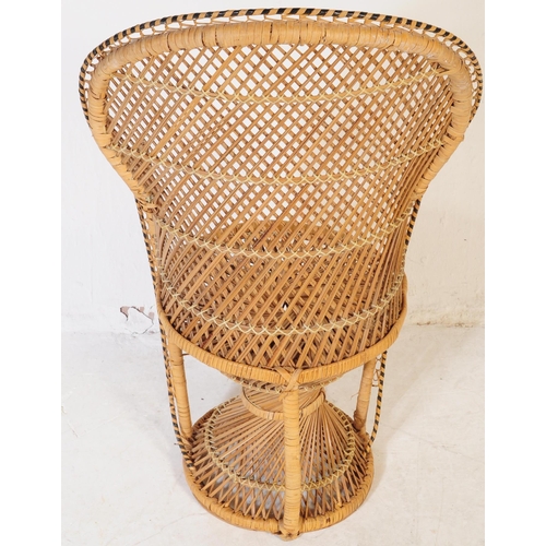 633 - A vintage 20th century circa 1980s bamboo wicker rattan garden conservatory chairs. One larger of ci... 