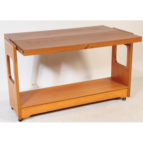 636 - A retro mid 20th Century 1970's metamorphic chrome two tier folding tea / drinks cocktail trolley ha... 