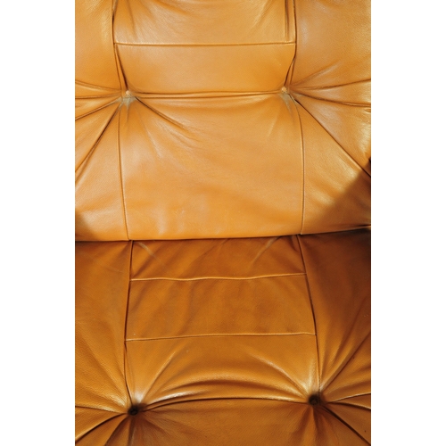 637 - A vintage tan PVC leather stress-less style recliner swivel chair in the manner of Ekornes. The armc... 