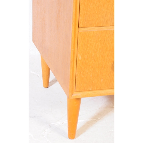 638 - Meredew Furniture - A  Mid-century teak wood pedestal chest of drawers. Raised on tapering legs with... 