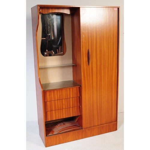 641 - A retro vintage mid century 1950s teak wood lobby wardrobe cupboard compactum by Hubbi Robe having a... 