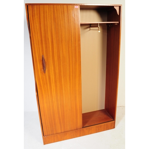 641 - A retro vintage mid century 1950s teak wood lobby wardrobe cupboard compactum by Hubbi Robe having a... 