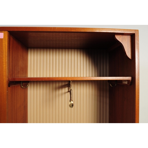 641 - A retro vintage mid century 1950s teak wood lobby wardrobe cupboard compactum by Hubbi Robe having a... 