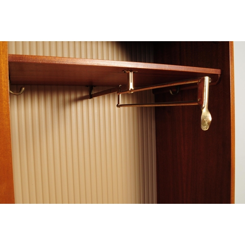 641 - A retro vintage mid century 1950s teak wood lobby wardrobe cupboard compactum by Hubbi Robe having a... 