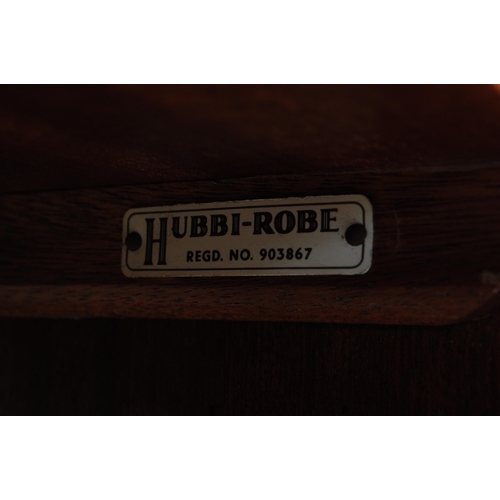 641 - A retro vintage mid century 1950s teak wood lobby wardrobe cupboard compactum by Hubbi Robe having a... 