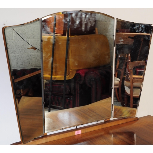 642 - A mid century bleached mahogany dressing table and stool in the manner of Wrighton Furniture. Raised... 