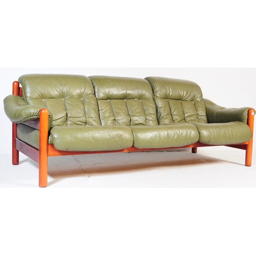 643 - A vintage mid-century 3 seater sofa in green leather and mahogany in the style of Jean Gillon. Green... 