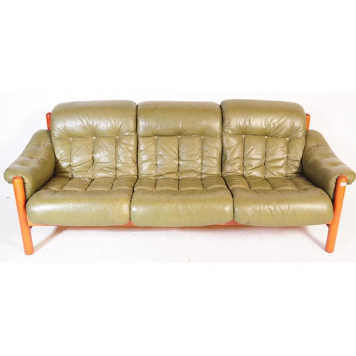 643 - A vintage mid-century 3 seater sofa in green leather and mahogany in the style of Jean Gillon. Green... 