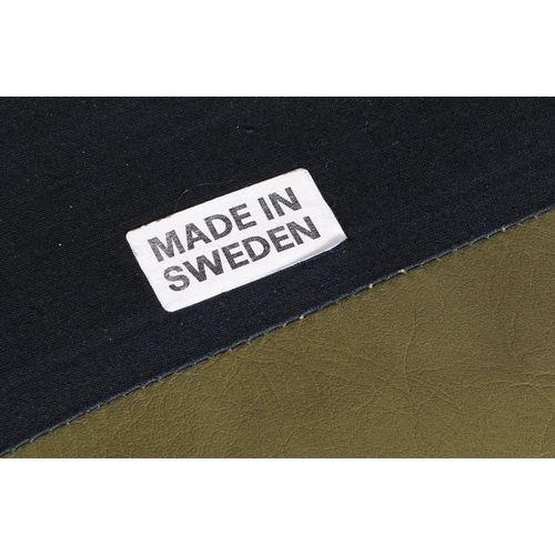 643 - A vintage mid-century 3 seater sofa in green leather and mahogany in the style of Jean Gillon. Green... 