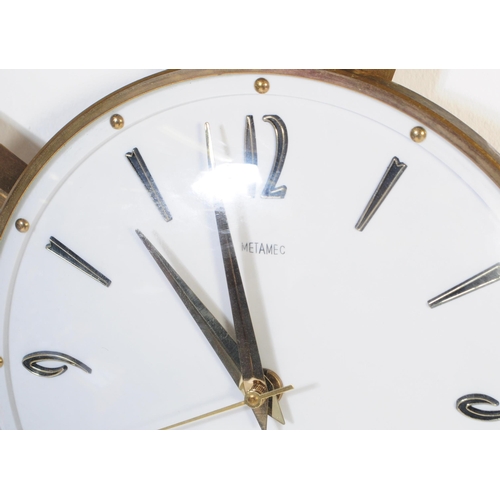 644 - An early vintage mid 20th century 1960's Metamec sunburst / star burst wall clock. The brass clock h... 