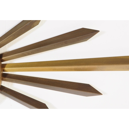 644 - An early vintage mid 20th century 1960's Metamec sunburst / star burst wall clock. The brass clock h... 