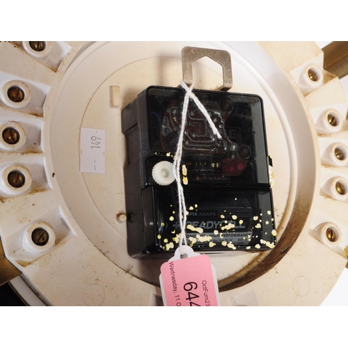 644 - An early vintage mid 20th century 1960's Metamec sunburst / star burst wall clock. The brass clock h... 