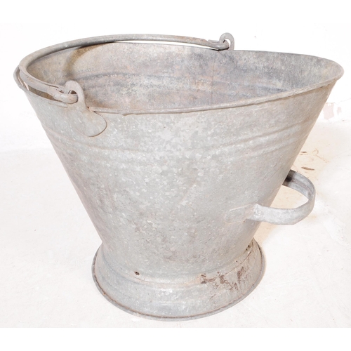 646 - An assortment of four 20th century industrial style galvanised metal buckets and watering can. Each ... 