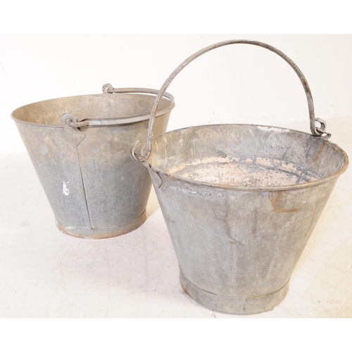 646 - An assortment of four 20th century industrial style galvanised metal buckets and watering can. Each ... 