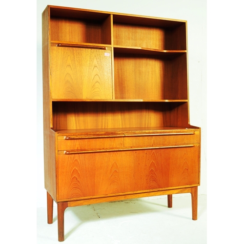 652 - McIntosh - Mid 20th century circa 19070s teak highboard sideboard. Having a configuration of shelves... 