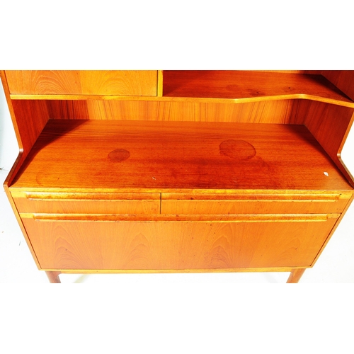 652 - McIntosh - Mid 20th century circa 19070s teak highboard sideboard. Having a configuration of shelves... 