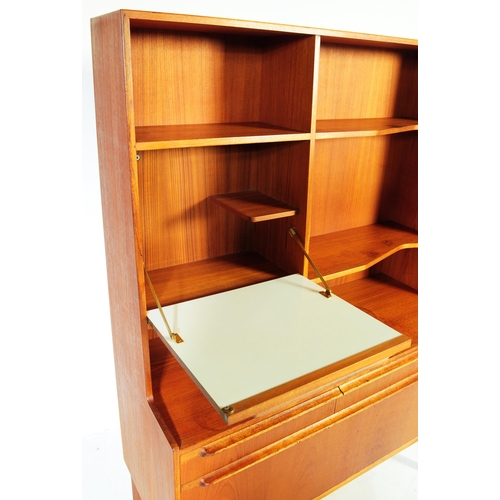 652 - McIntosh - Mid 20th century circa 19070s teak highboard sideboard. Having a configuration of shelves... 