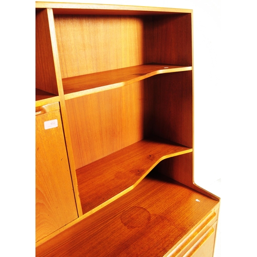 652 - McIntosh - Mid 20th century circa 19070s teak highboard sideboard. Having a configuration of shelves... 