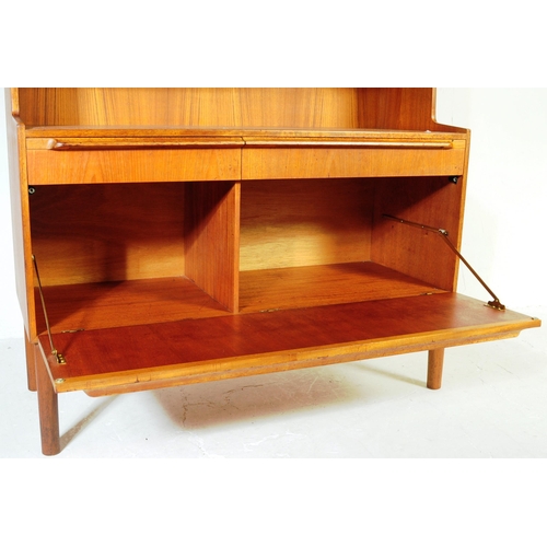 652 - McIntosh - Mid 20th century circa 19070s teak highboard sideboard. Having a configuration of shelves... 