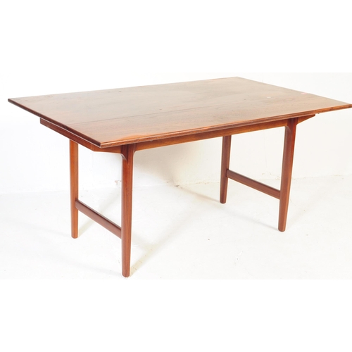 654 - British Modern Design - Mid 20th century teak drop leaf dining table with four chairs. The table of ... 