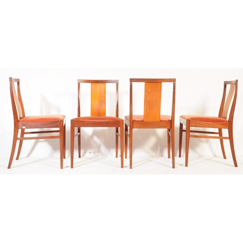 654 - British Modern Design - Mid 20th century teak drop leaf dining table with four chairs. The table of ... 
