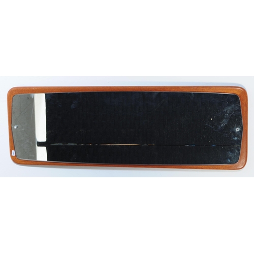 655 - A mid 20th century Danish inspired hanging wall mirror. Having a rectangular mirrored panel mounted ... 
