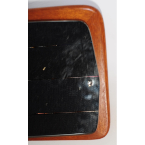 655 - A mid 20th century Danish inspired hanging wall mirror. Having a rectangular mirrored panel mounted ... 