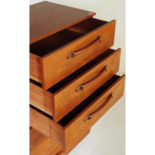 660 - British Modern Design - Retro mid 20th century teak veneered Tallboy chest of drawers. Rectangular f... 