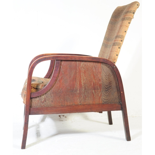 662 - A vintage 20th century circa 1930s Art Deco reclining armchair. Having a square chequered pattern up... 