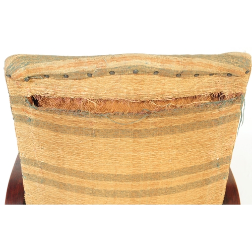 662 - A vintage 20th century circa 1930s Art Deco reclining armchair. Having a square chequered pattern up... 