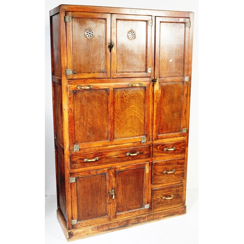 663 - A vintage 20th century oak kitchen larder pantry cabinet. Of rectangular form with a configuration o... 