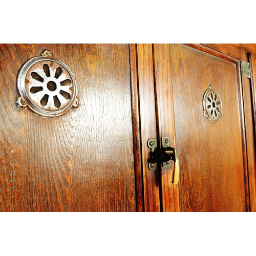 663 - A vintage 20th century oak kitchen larder pantry cabinet. Of rectangular form with a configuration o... 