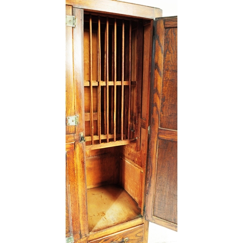 663 - A vintage 20th century oak kitchen larder pantry cabinet. Of rectangular form with a configuration o... 