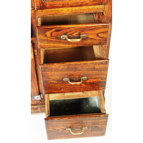 663 - A vintage 20th century oak kitchen larder pantry cabinet. Of rectangular form with a configuration o... 